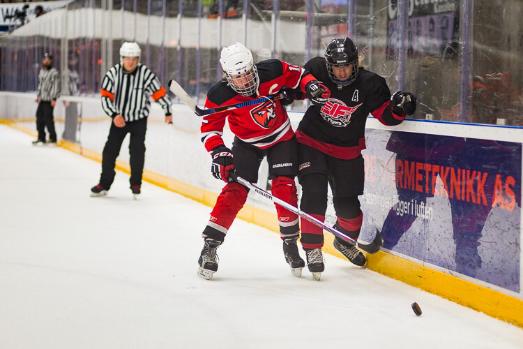 The final hockey image, after an adjustment brush was applied - Tips for Editing Hockey Photos in Lightroom