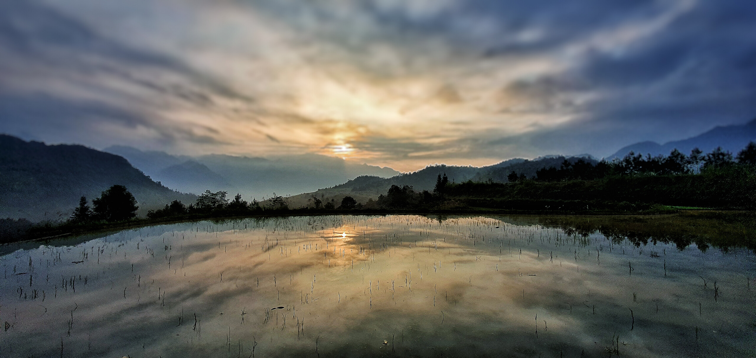 sunset landscape over hills