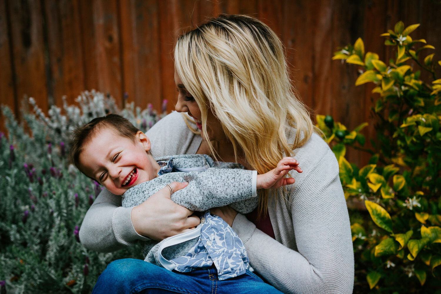 woman looking at child stunning portrait